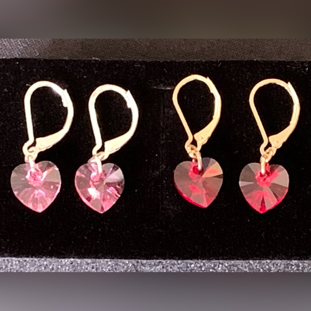 Set of two heart-shaped lever back earrings red and pink crystal